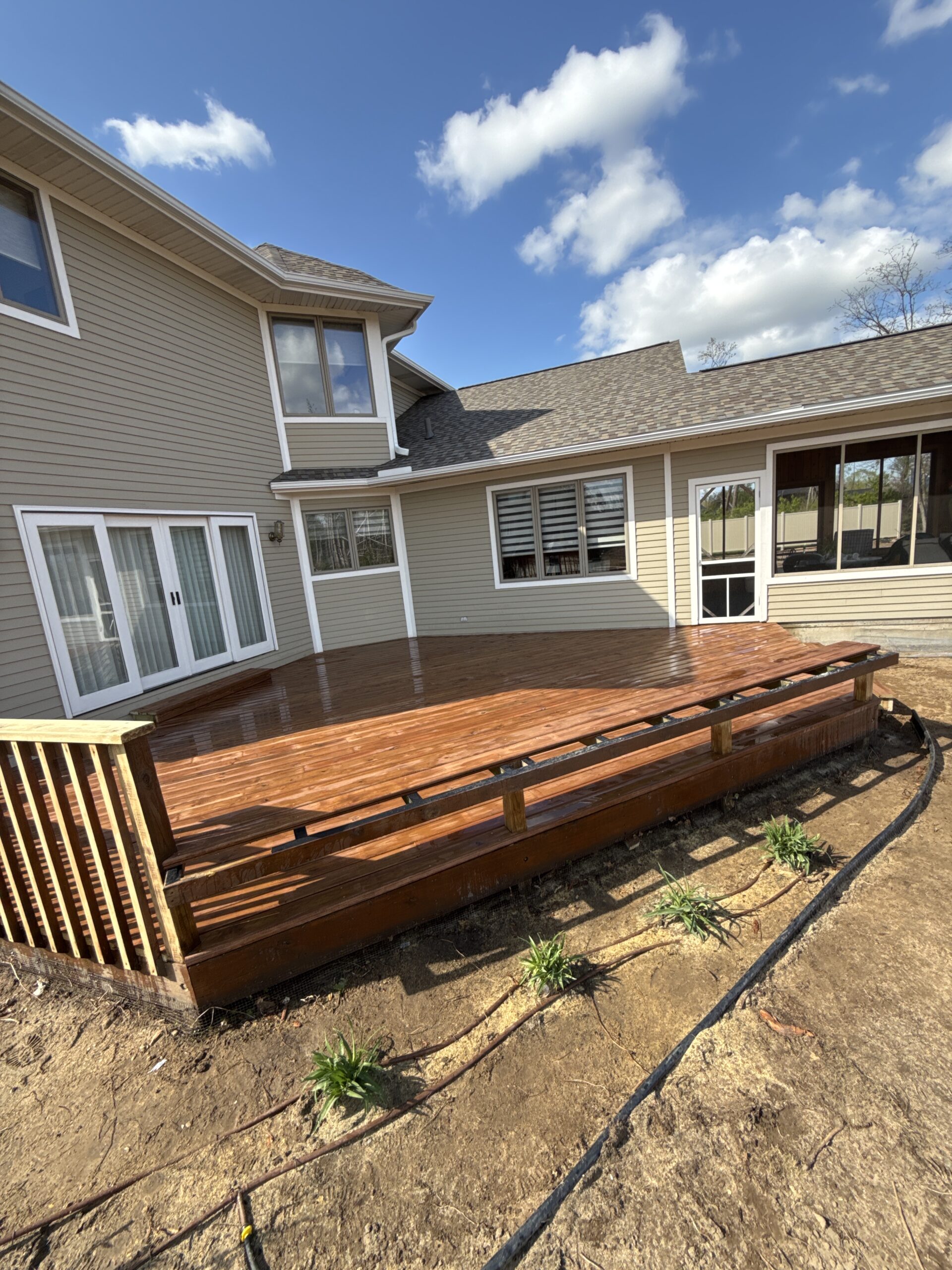 finished deck on back of home